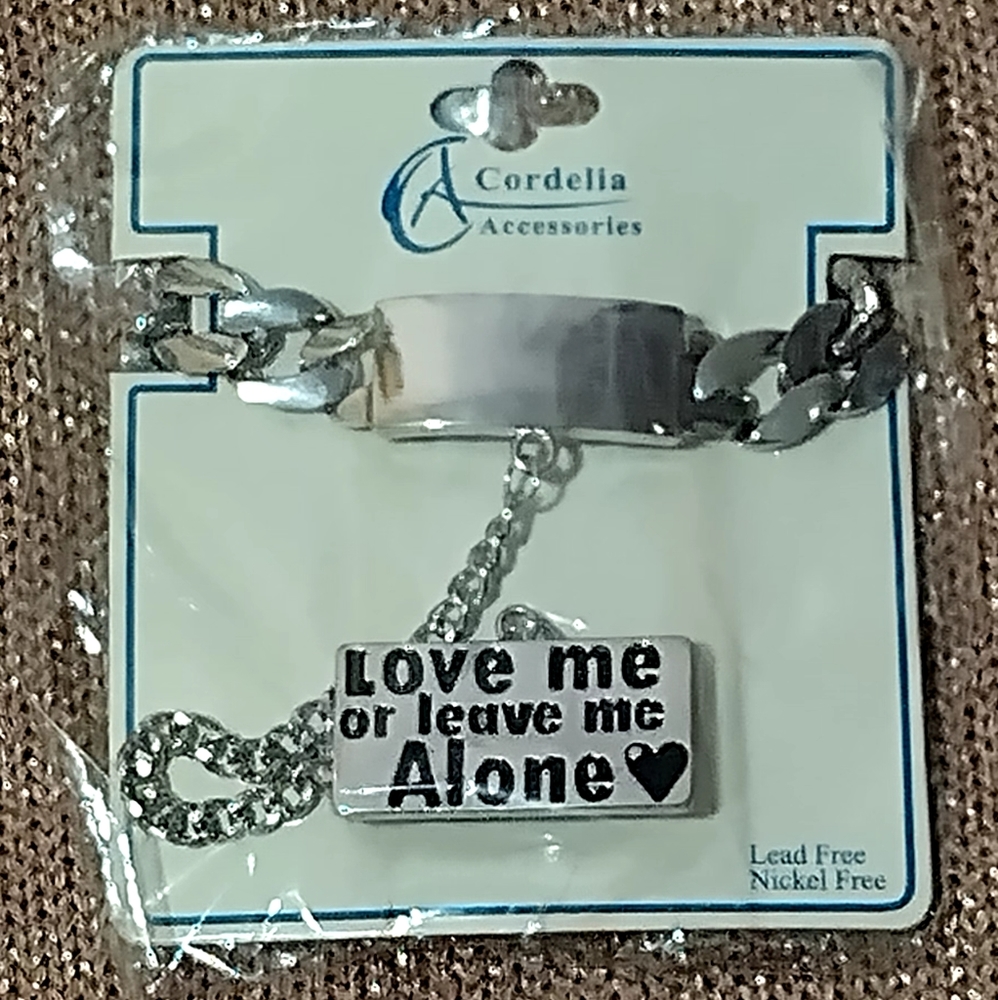 Bracelet with double rings attached with chain.